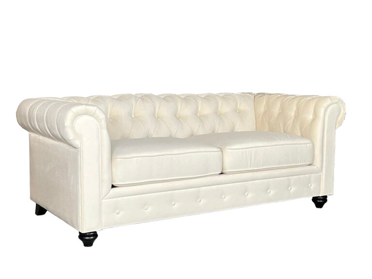 White tufted sofa on a white background