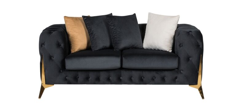 Black sofa with decorative cushions on a white background
