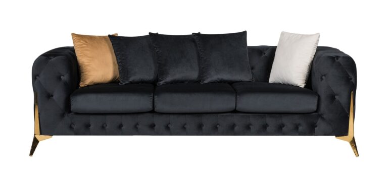 Black sofa with decorative cushions on a white background
