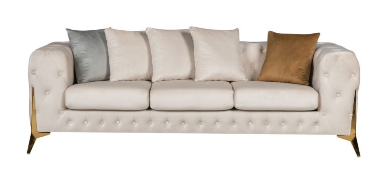 Cream sofa with decorative pillows on a white background